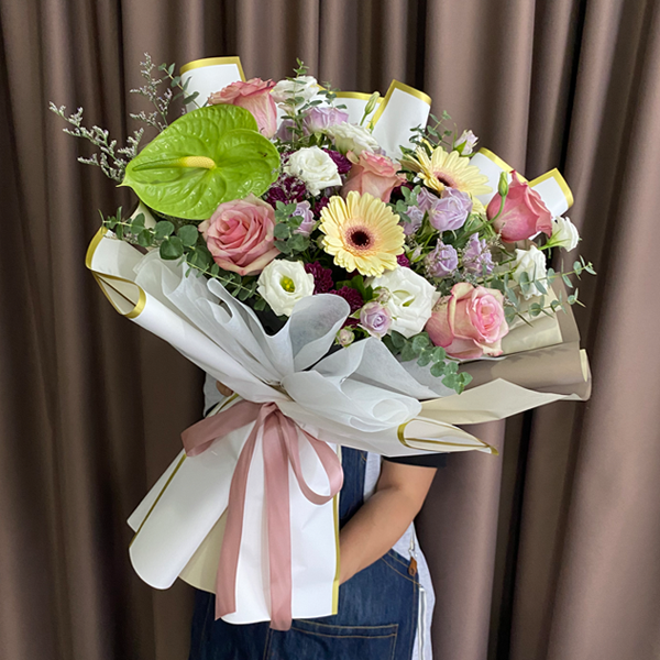 Limited Edition mixed flower bouquet featuring champagne Gerbera and brown roses by Giflorist