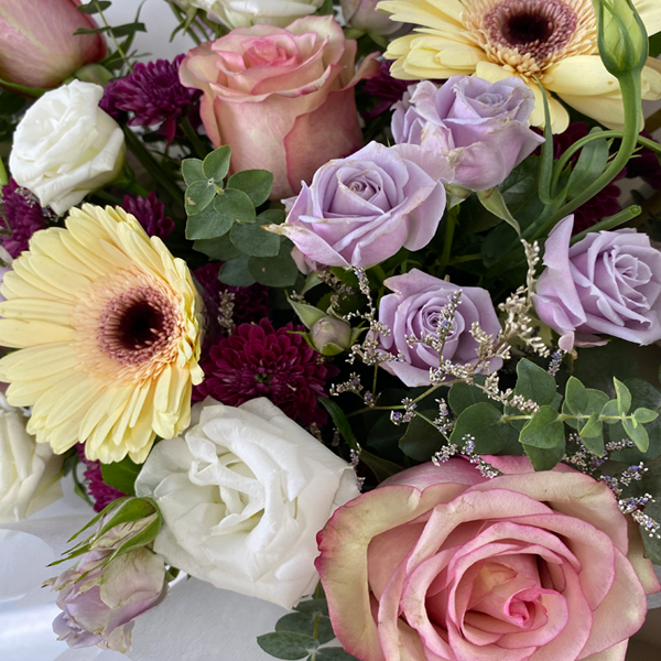 Limited edition mixed flower bouquet featuring champagne gerbera and brown roses by Giflorist